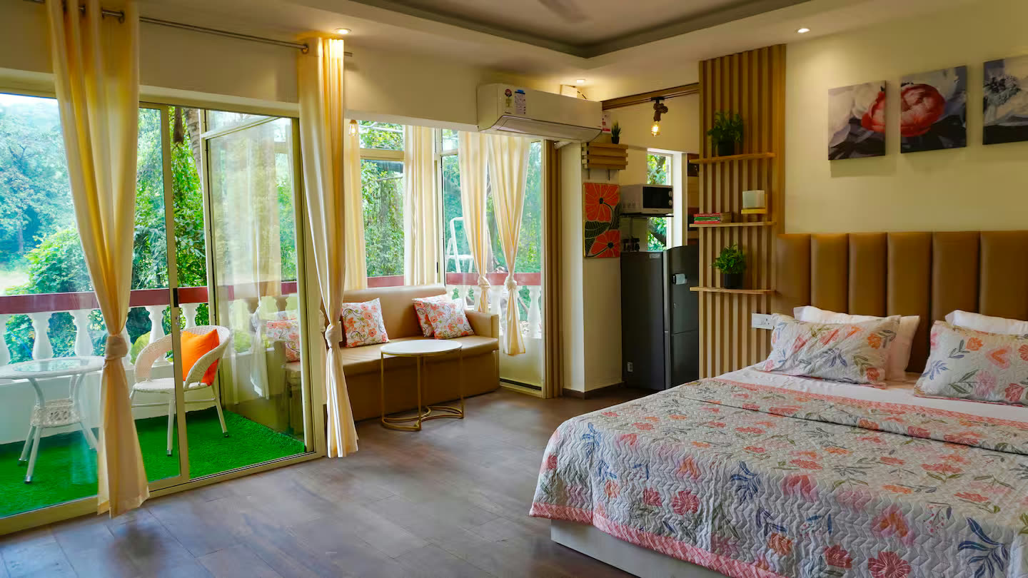 Sunlit studio interior at a Coast and Cloud stay in Goa